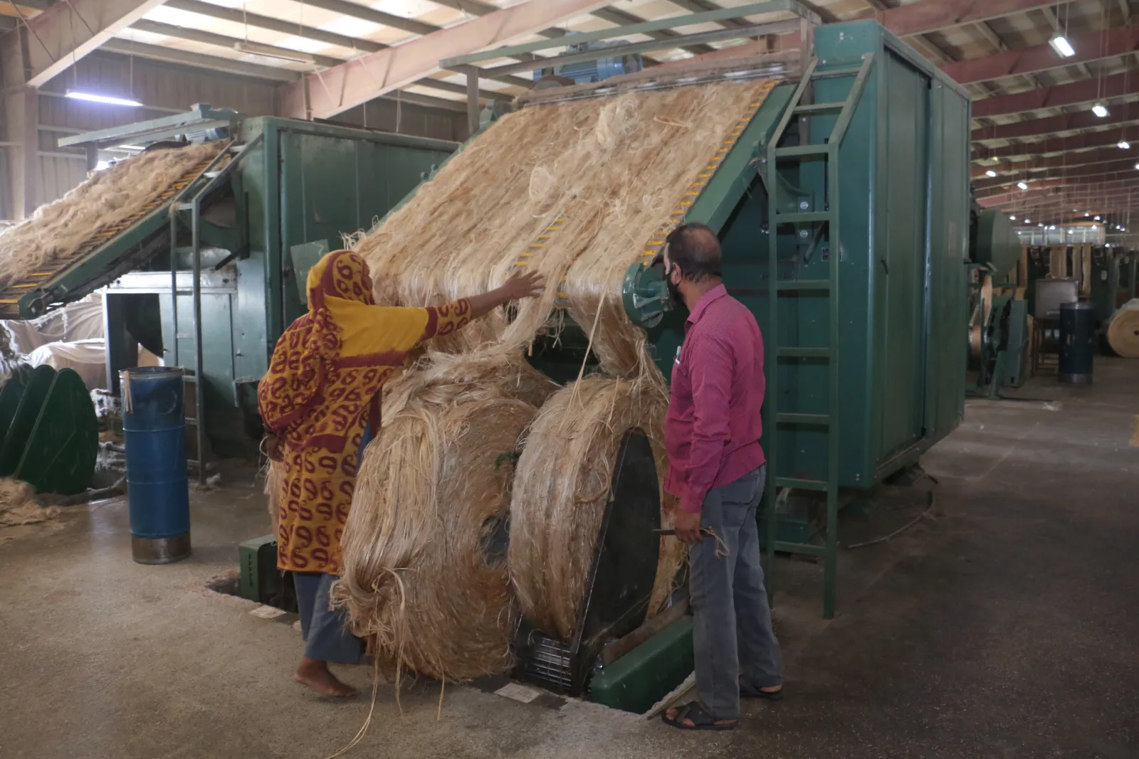 Raw jute fiber fed into carding machines at Wahab Jute Mills, Bangladesh